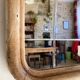 Art nouveau mirror, curved wooden frame and chiseled glass