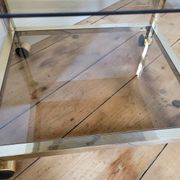 Gold metal and smoked glass serving trolley