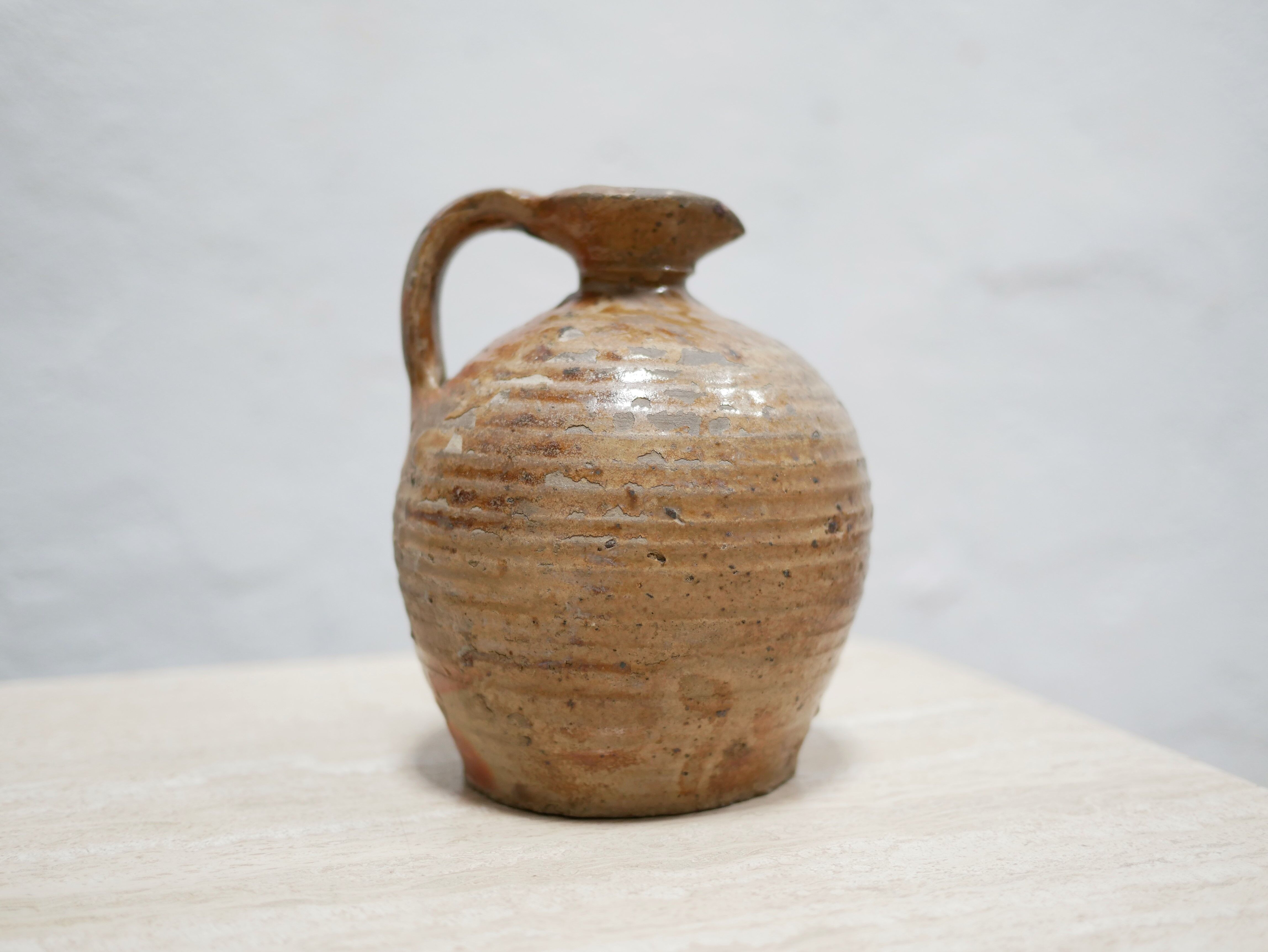 Old glazed terracotta jar