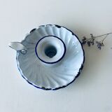 Antique candle holder in white and blue enamelled metal