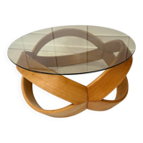 Smoked glass and curved wood coffee table