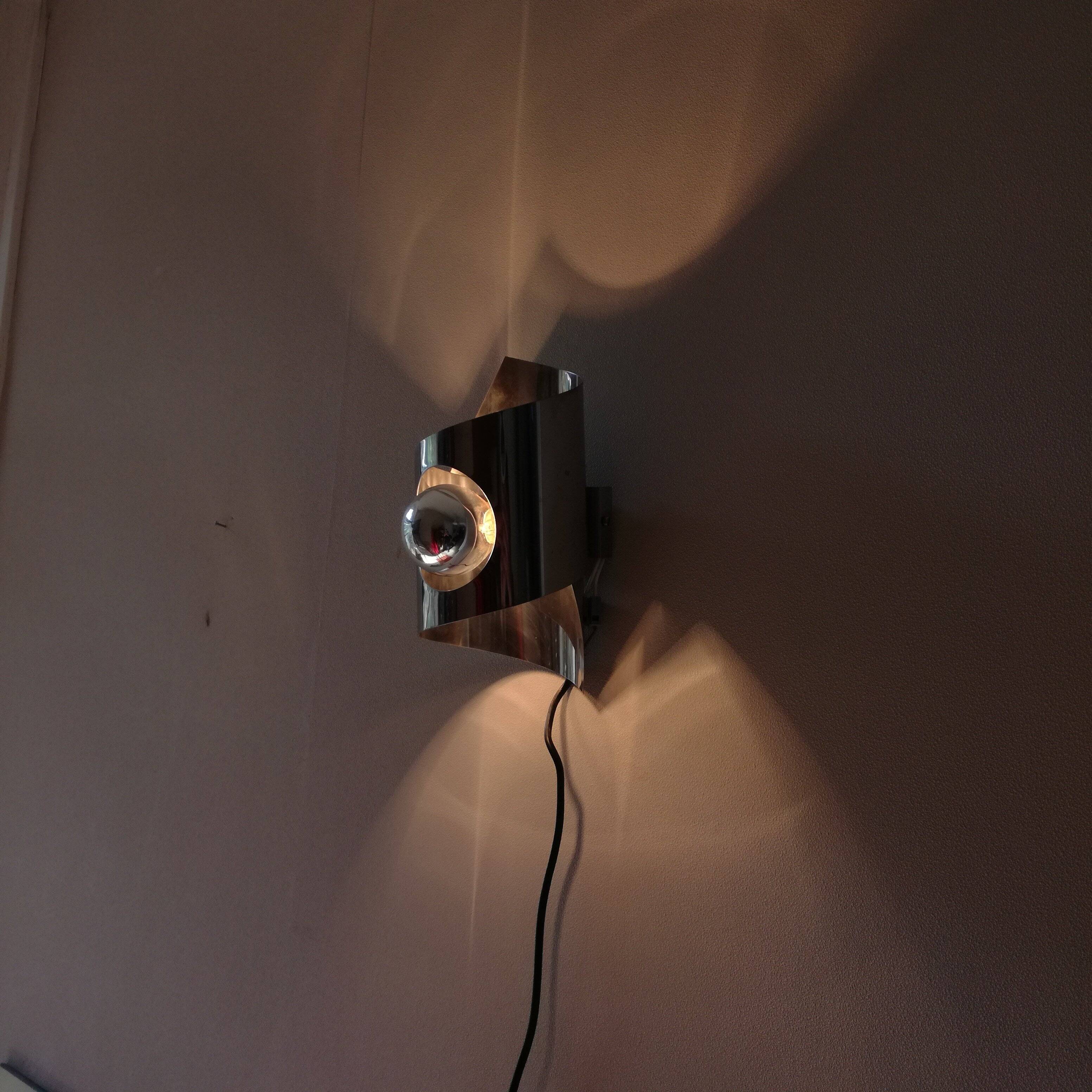 Space Age polished stainless steel wall light from the 1970s