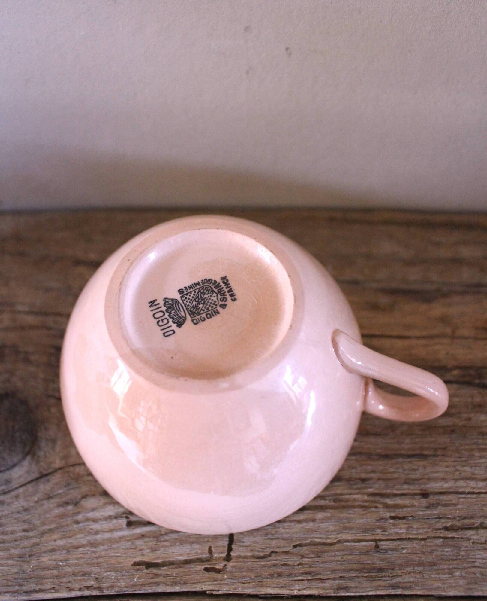 A set of two Digoin Sarreguemines Marylou Rose Art Deco cups.
