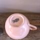 A set of two Digoin Sarreguemines Marylou Rose Art Deco cups.