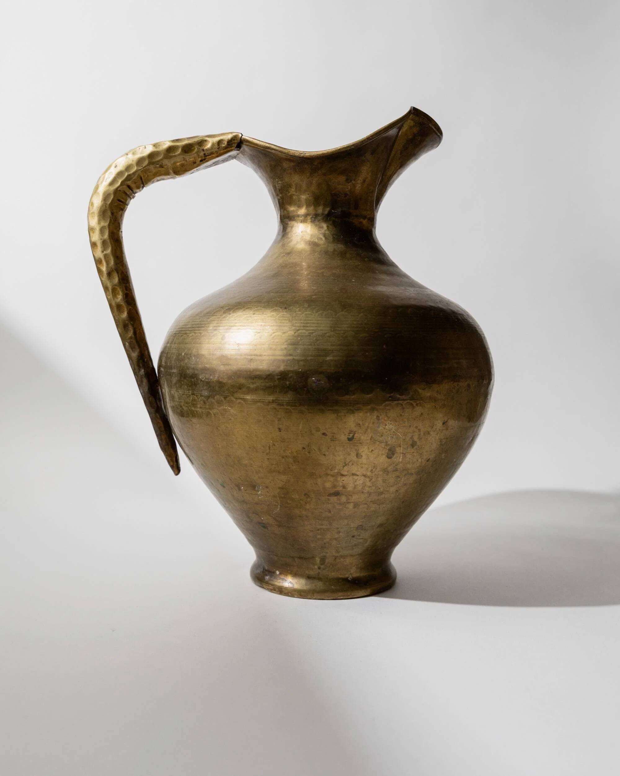 Vintage brass vase from the 1940s, hand-hammered metal, amphora shape, Italian design from the 1940s.