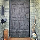Copper brutalist entrance door, 70s architecture