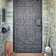 Copper brutalist entrance door, 70s architecture