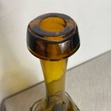 Glass carafe encased in wrought iron