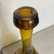 Carafe en verre enchâssée dans du fer forgé