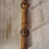 Turned wooden coat rack.