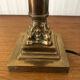 Ancient lamp foot candlestick corinthian column in bronze