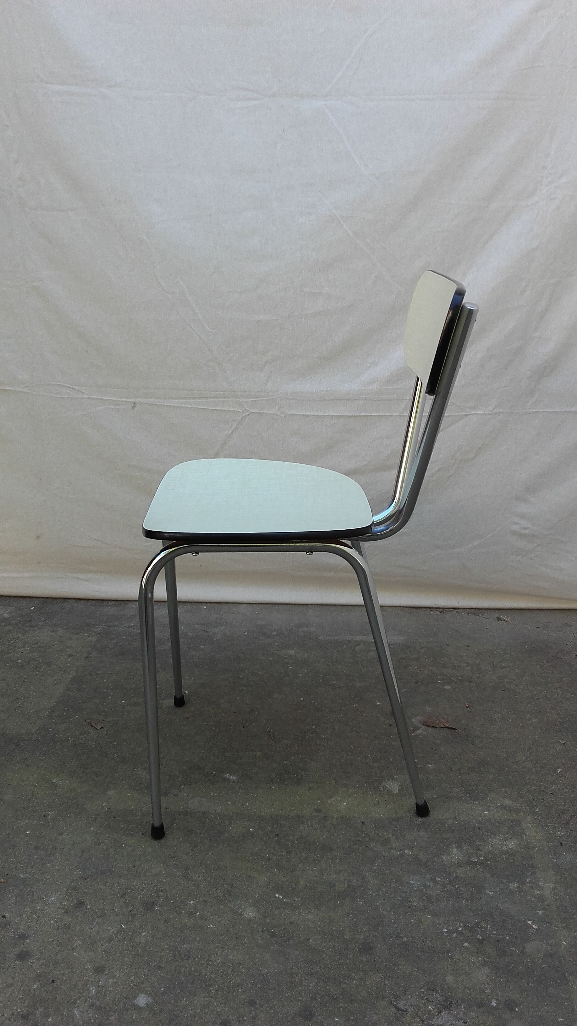 Six ivory formica chairs