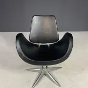 Alipes black swivel salon chair with chrome star base by Giorgetto Giugiaro for Gamma & Bross, Italy, contemporary, 85 × 70 × 60 cm