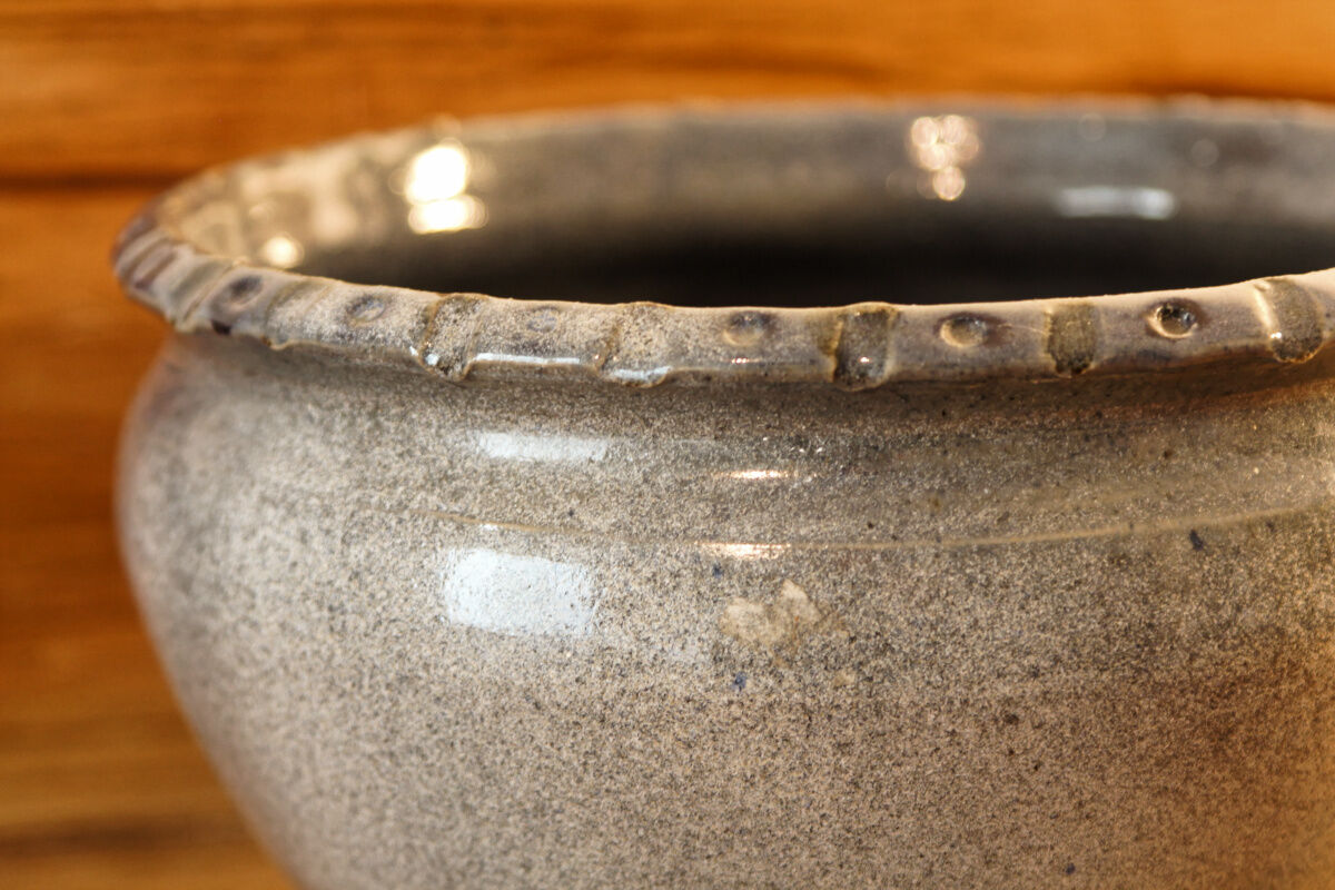 Cache pot in bluish sandstone, signed