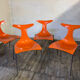 4 orange chairs Delfy chairs design Gino Carollo Ciacci Kreaty