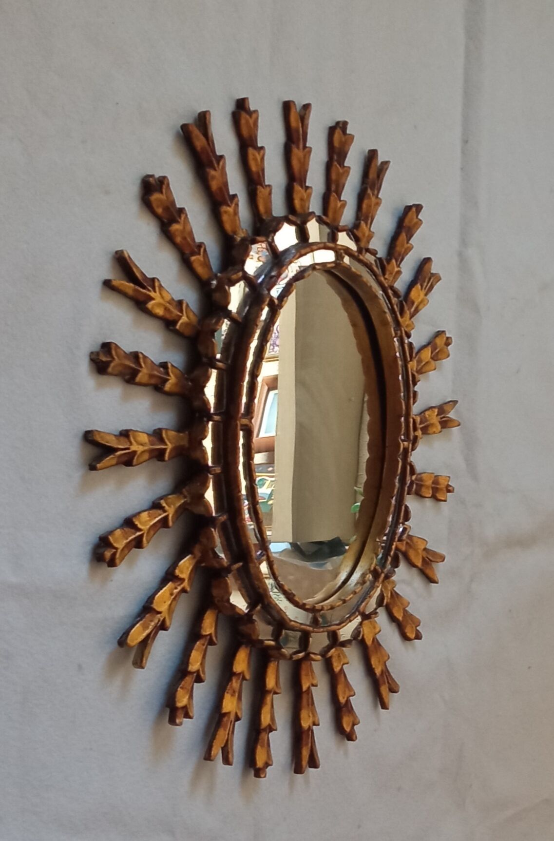 Sun mirror in gilded wood, 60x52 cm