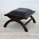 1970s, vintage armchair with footstool, black furniture leather.