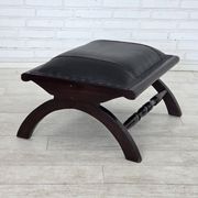 1970s, vintage armchair with footstool, black furniture leather.