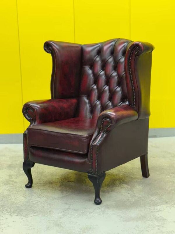 Fauteuil chesterfield en cuir bourgogne avec accoudoirs (Le prix est pour un)
