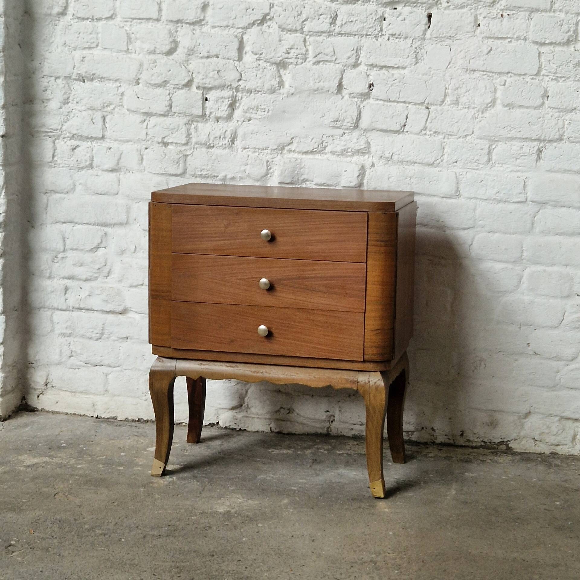 Small vintage Art Deco piece with 3 drawers, curved legs and caps.
