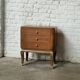 Small vintage Art Deco piece with 3 drawers, curved legs and caps.