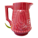 Burgundy/red ceramic pitcher