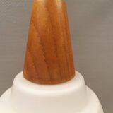 Lamp in white glass with teak top. It is Danish and estimated from the 1970s-1980s.