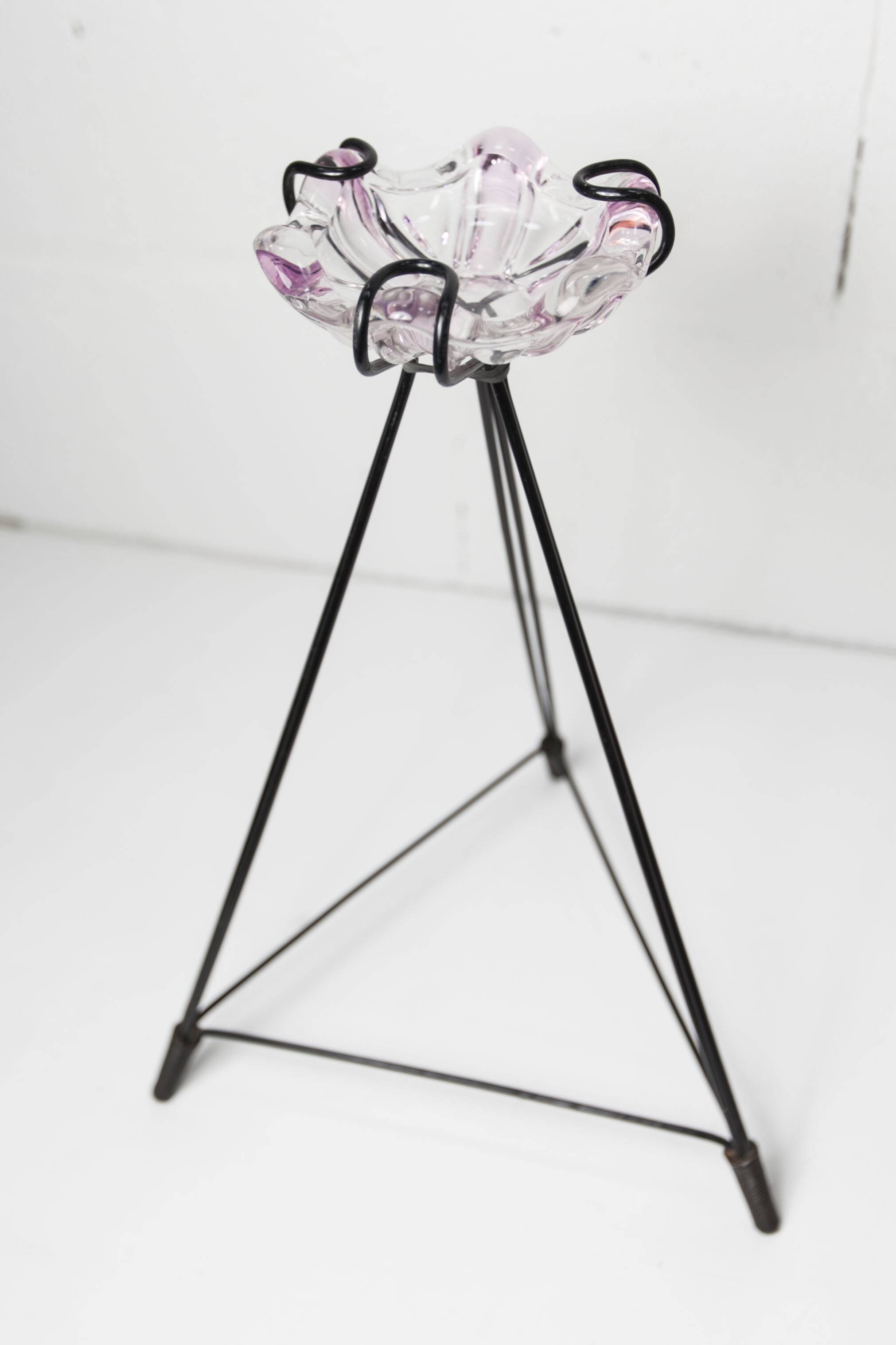 Ashtray on black colored glass stand 1970