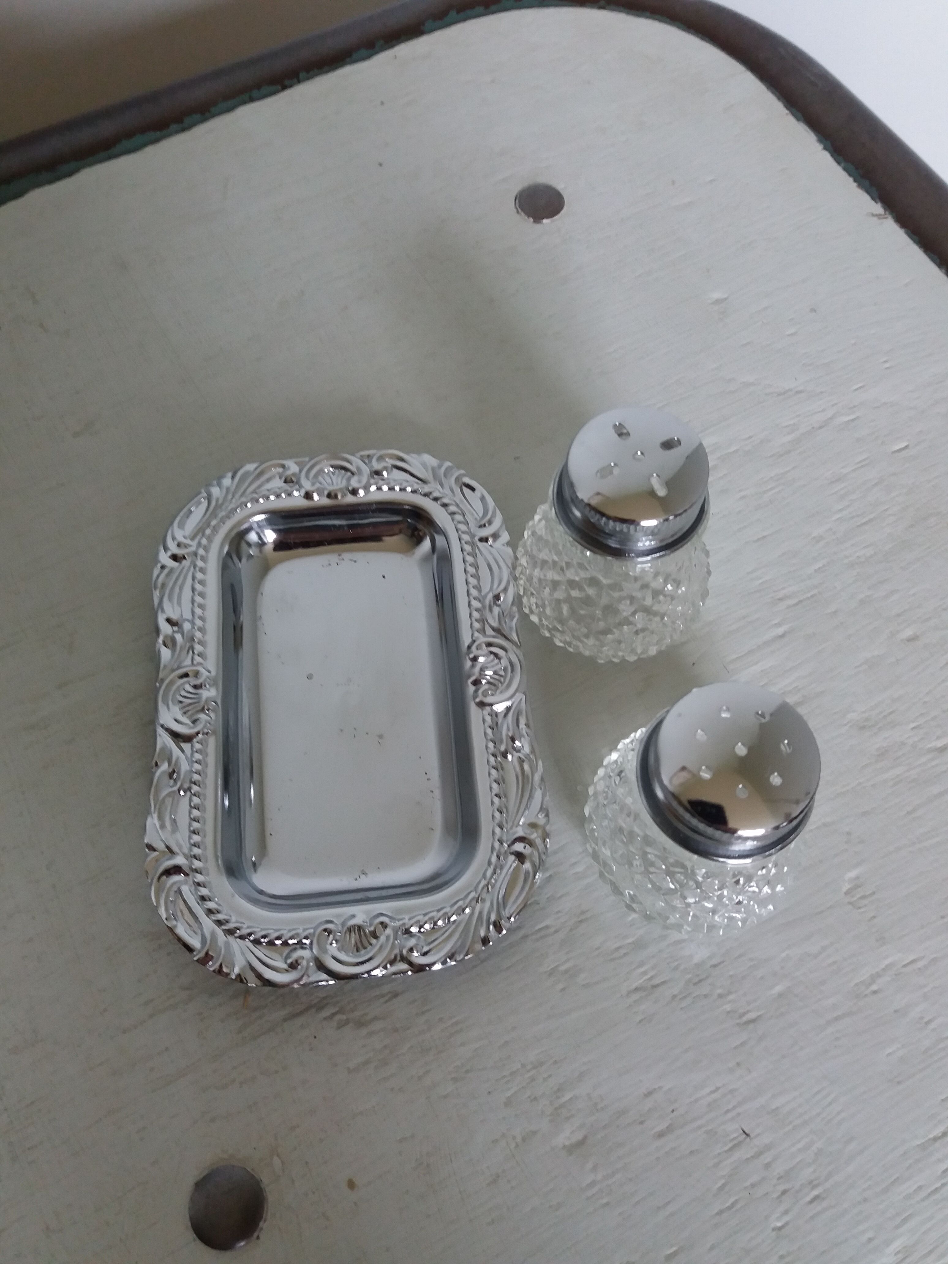 Salt shaker and pineapple shaped pepper