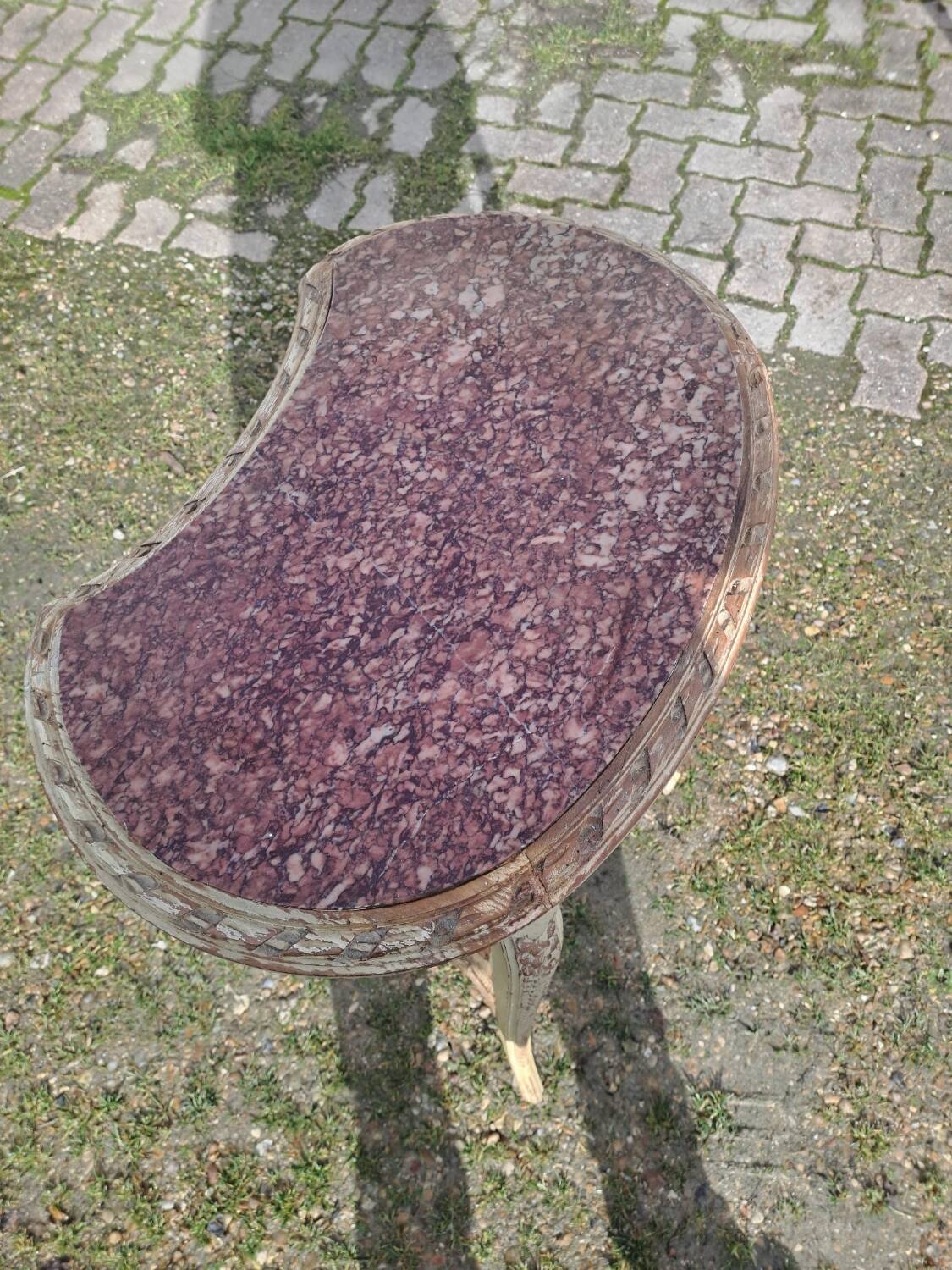Patinated pedestal table in the transitional style of the 1900s with a marble top. Dimensions