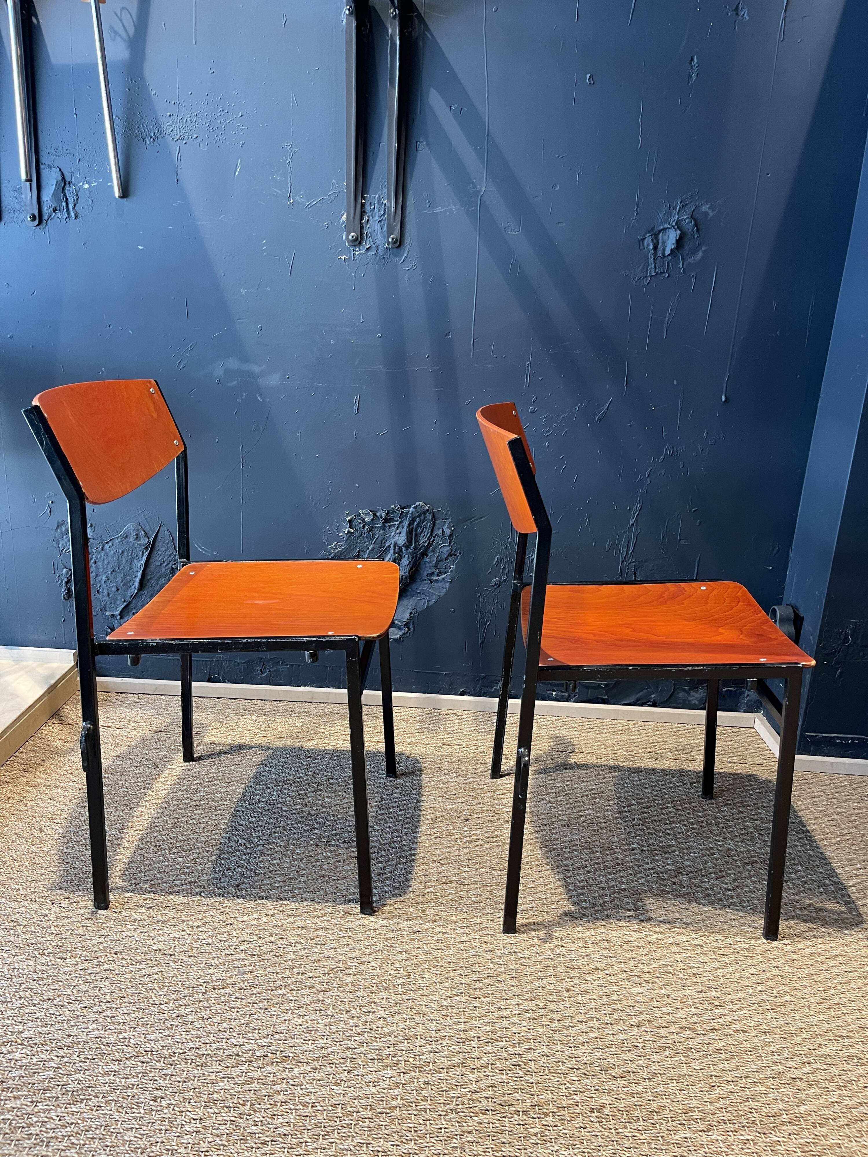 Pair of Gijs Van Der Sluis chairs in orange wood with black legs, Netherlands