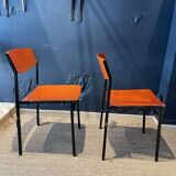 Pair of Gijs Van Der Sluis chairs in orange wood with black legs, Netherlands