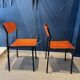 Pair of Gijs Van Der Sluis chairs in orange wood with black legs, Netherlands