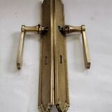 Pair of Louis XVI style beaded bronze door handles