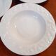 Set of 6 white ceramic deep plates made in Italy.