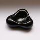 Biomorphic vacuum-pocket cup - black modeled ceramic - 1950's