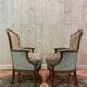 Paire de fauteuils bergères de style Louis XVI