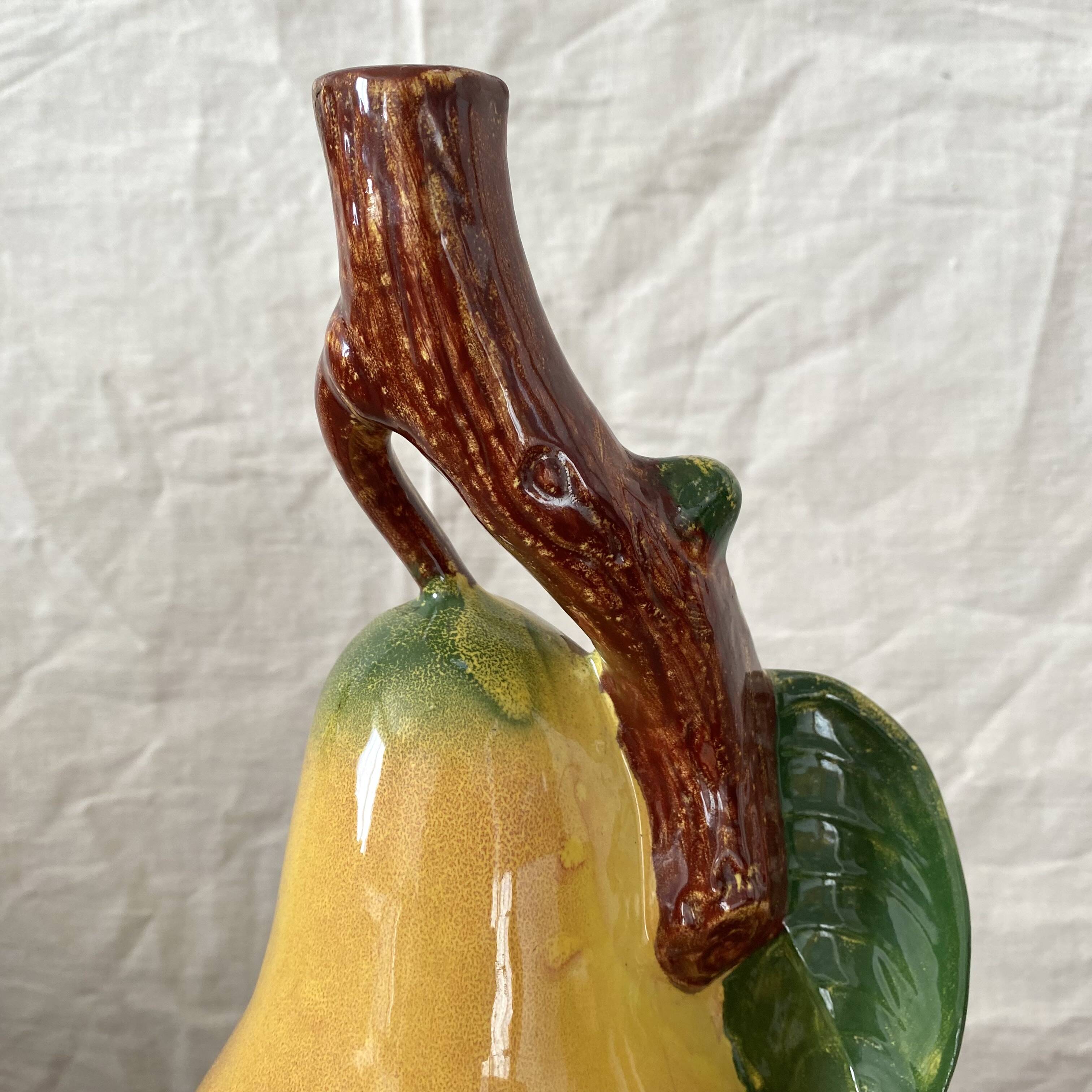 Vintage ceramic bottle in the shape of a pear.