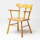 Danish organic armchair in solid birch, curved backrest, 1950s design.