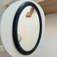 Vintage oval mirror in petrol blue wood