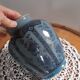 Decorative vase in blue glazed ceramic with floral decoration and arabesques, circa 1930
