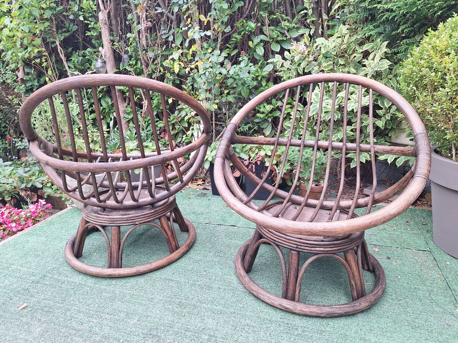 Pair of vintage rattan swivel armchairs