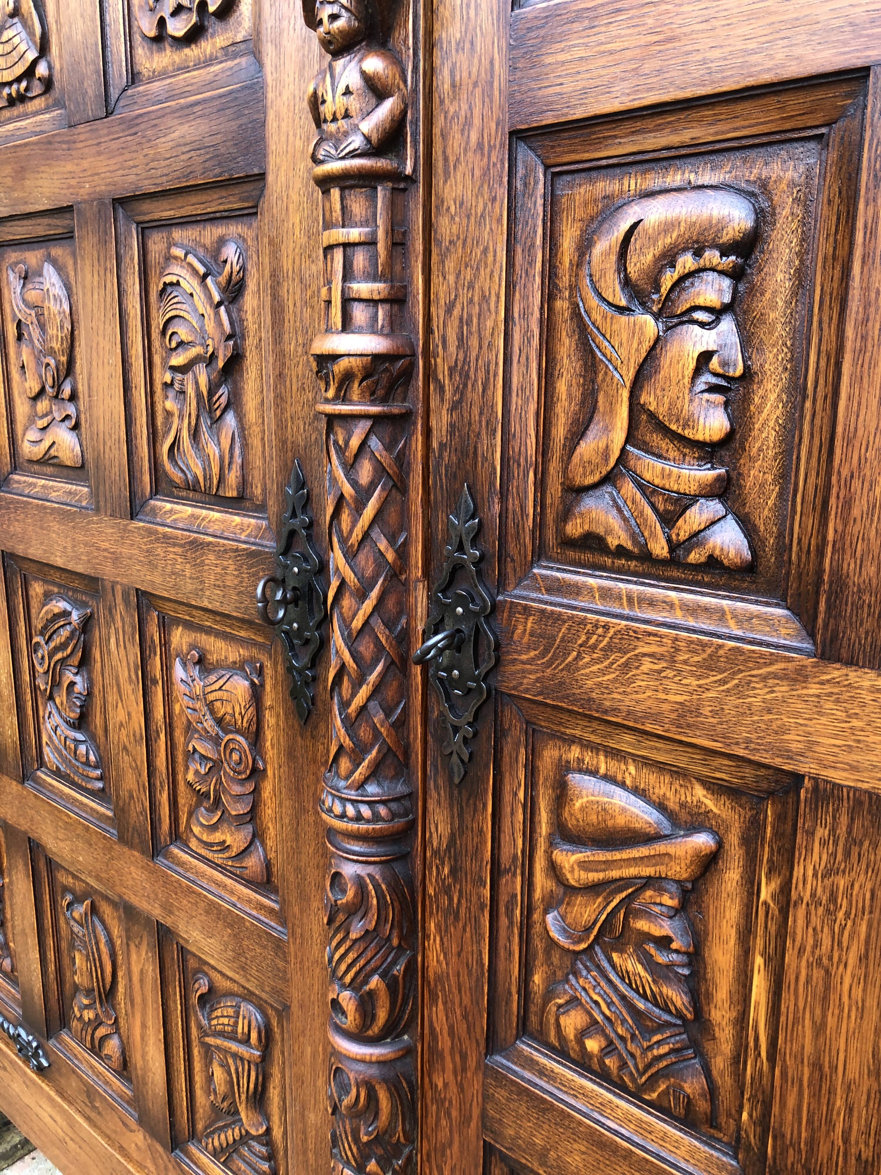 Spanish furniture with carved wood profiles and coats of arms from the 1950s.