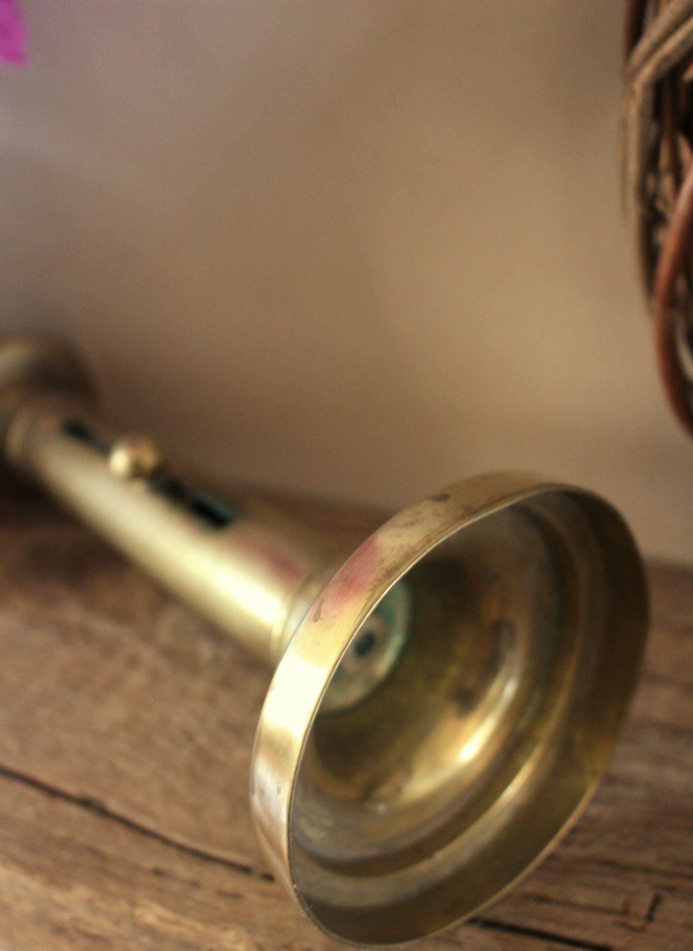 Push-button brass torch candle holder
