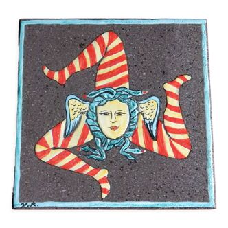 Lava stone tile representing La Trinacrie