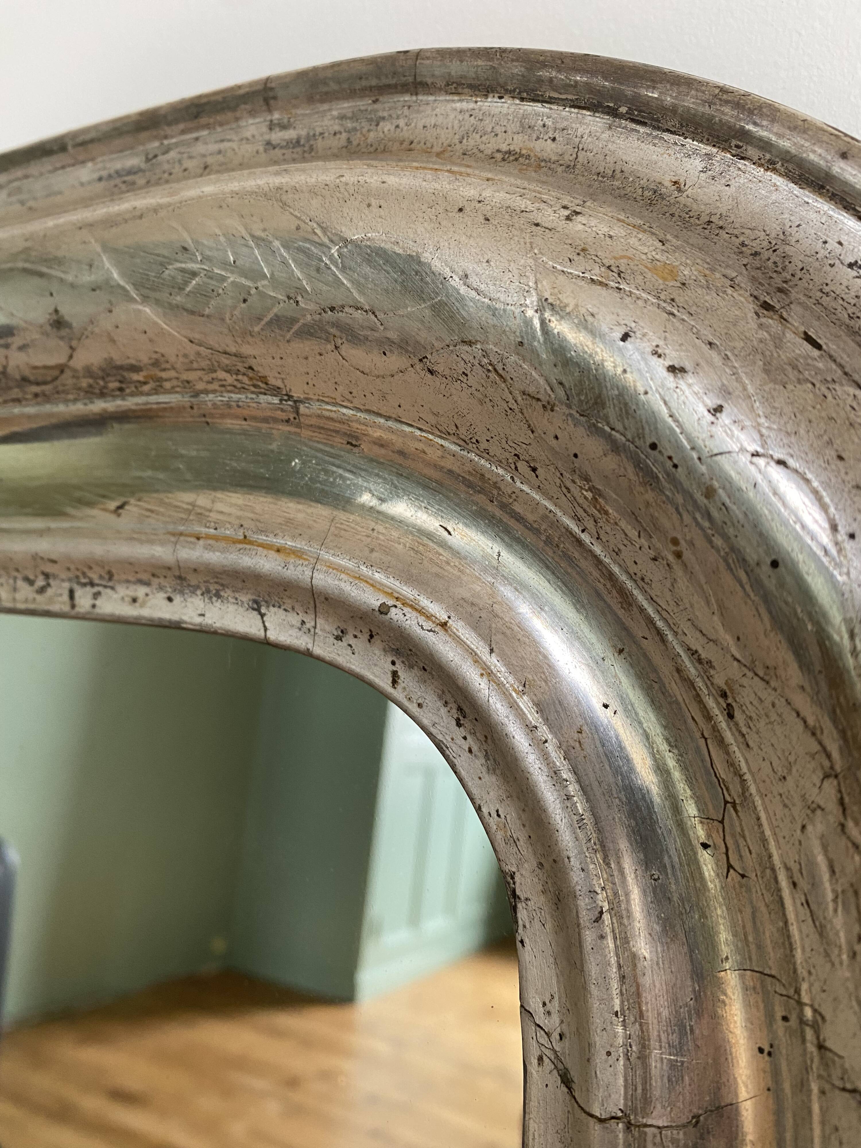 Louis-Philippe mirror gilded with silver leaf