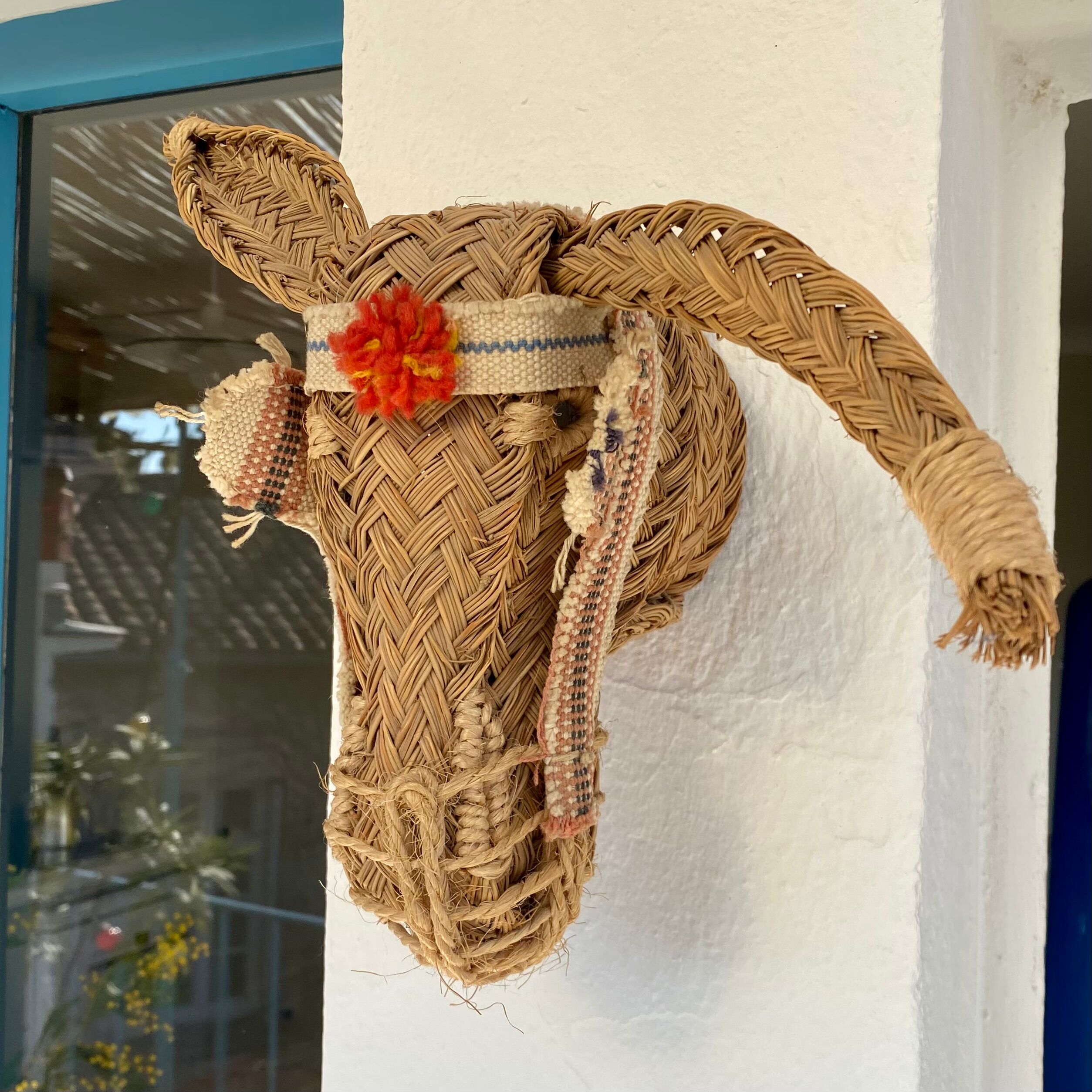 Straw donkey head trophy
