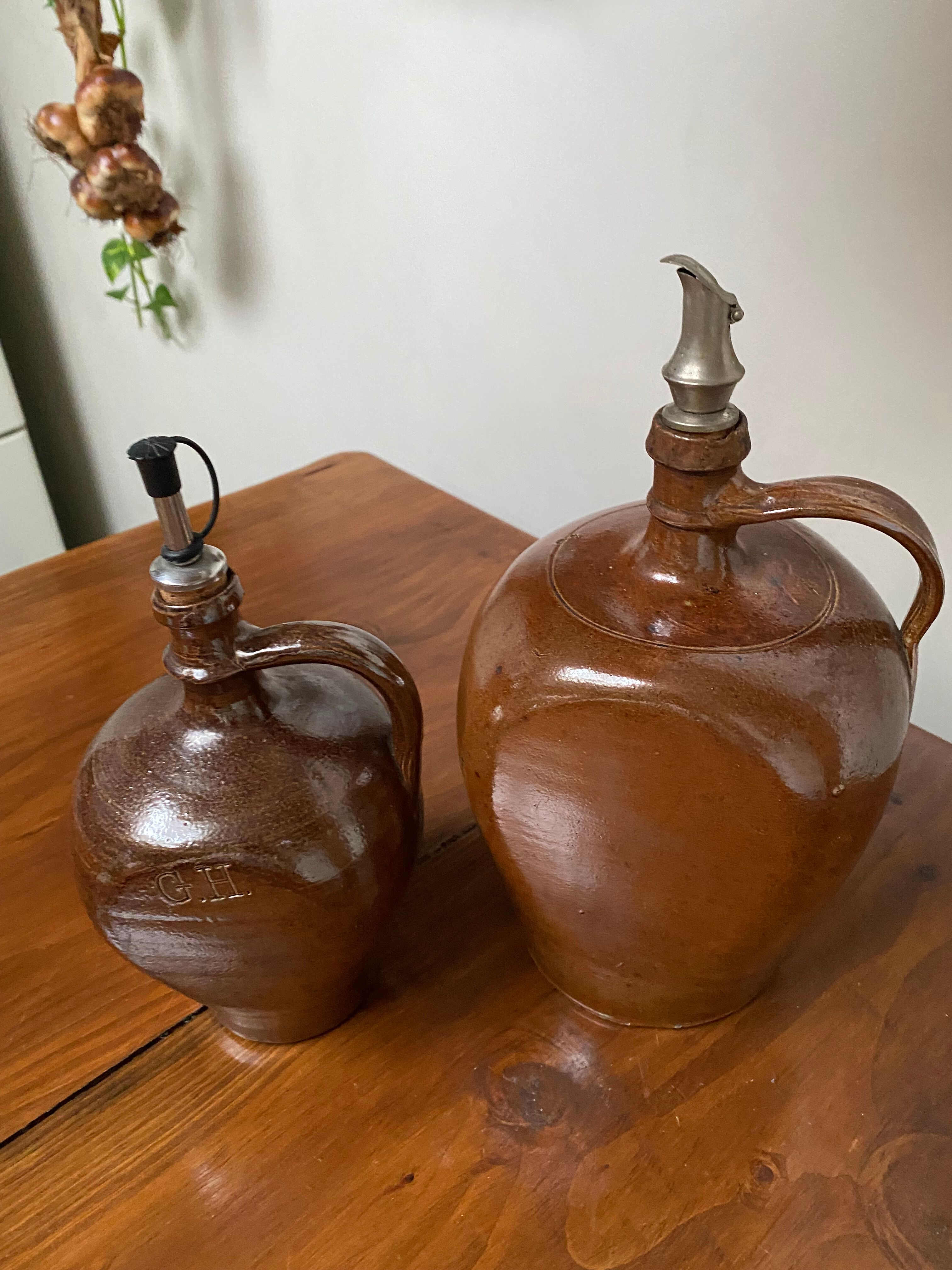 Pair of bottles in sandstone