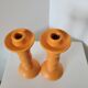 2 orange ceramic candle holders