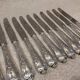 12 silver-plated dessert knives by silversmith Florian Frionnet, 21.2cm